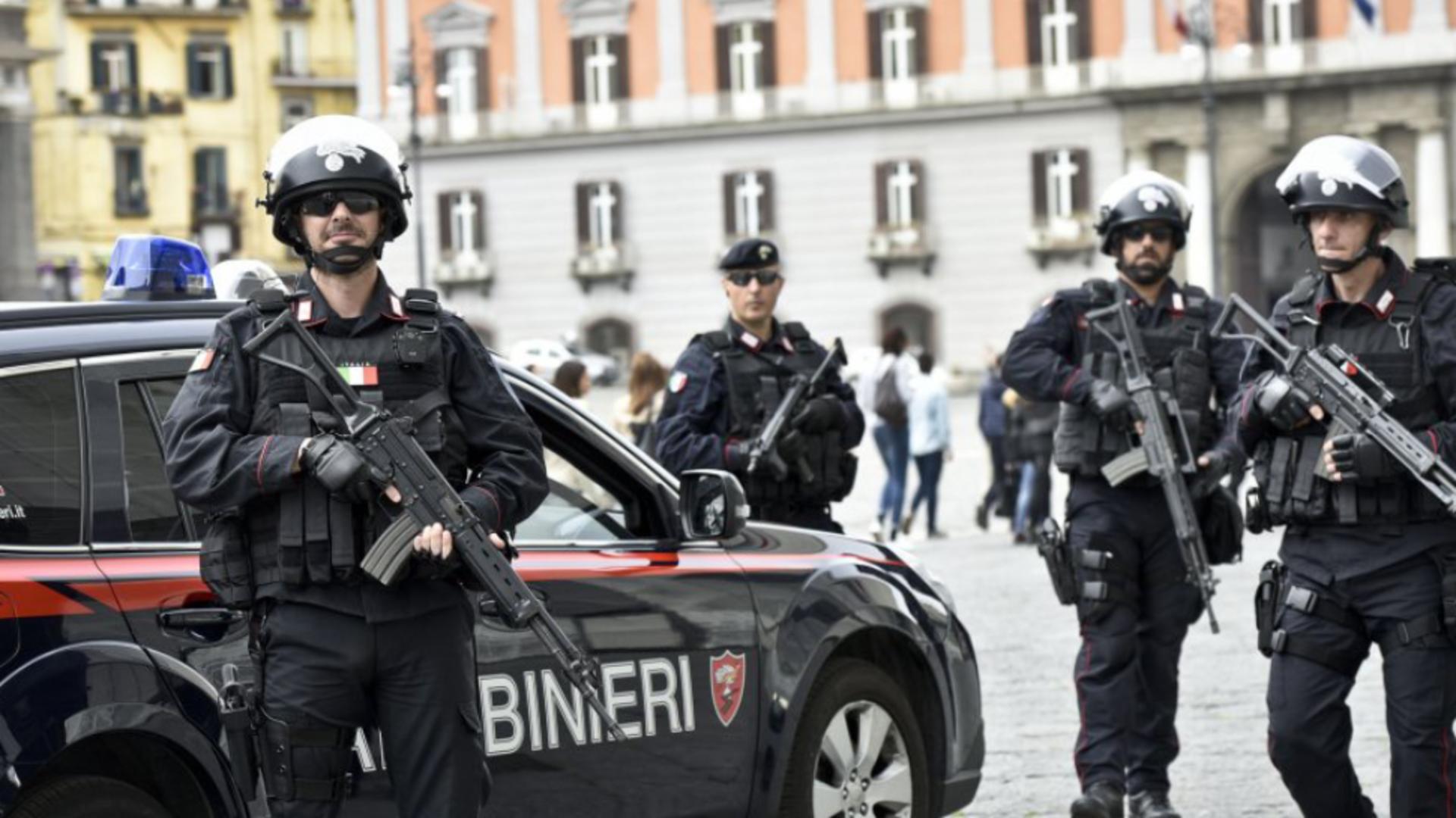 Doi români, arestați în Milano. Au furat arma unui polițist și au deschis focul după ce i-au furat ceasul si mașina unui italian